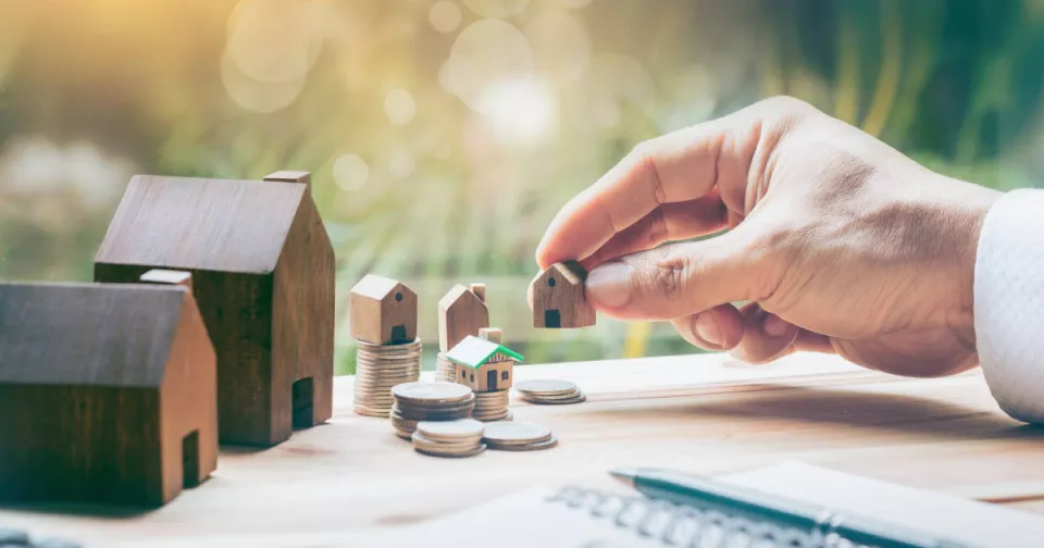 Why should you prefer a real-estate investment to a savings account ? 
